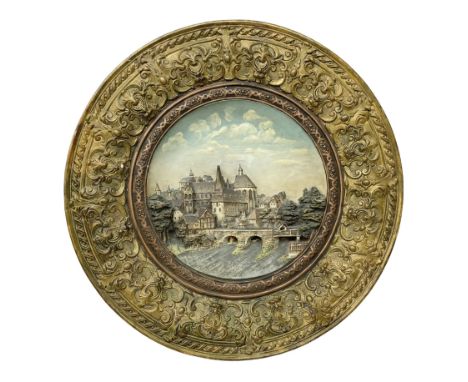 Large German wall charger by Wilhelm Schiller &amp; Son, the central panel decorated with riverside town scene of high relief
