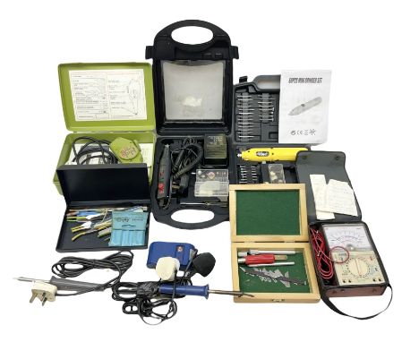 An electric mini drill with accessories, electric engraving tool, mini grinder, electric multi-tester, cutting knives and bla