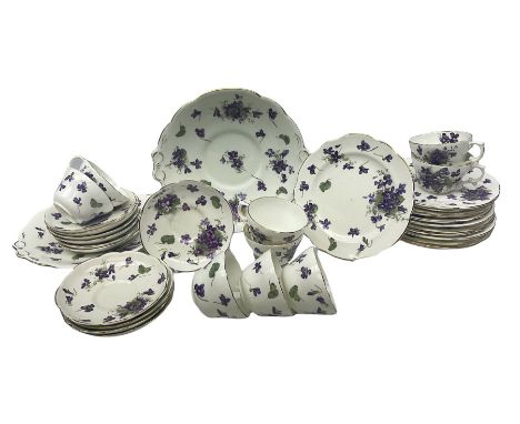 Hammersley Violets pattern tea wares comprising, nine cups and eleven saucers, thirteen dessert plates and two cake plates