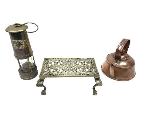 Welsh E Thomas &amp; Williams Ltd Aberdare brass miners lamp, together with a 19th century brass trivet with scrolling pierce