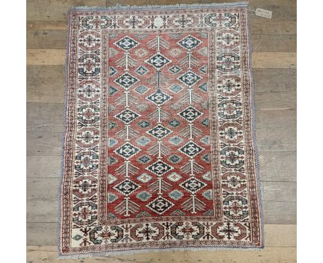 A Kazak red ground rug&nbsp;, 172 X 134 cm