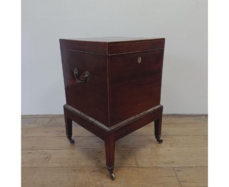 A 19th century mahogany wine cooler, on square tapering legs, lacking interior, 36 cm wide