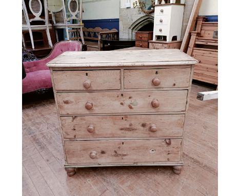 A pine chest, having two short and three long drawers, 100 cm wide, a pine desk, 104 cm wide and a TV stand, 95 cm wide (3)