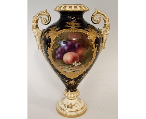 A Coalport vase, with deep blue ground, oval cartouche painted fruit, highlighted in gilt, 20 cm highPossibly lacking lid, no