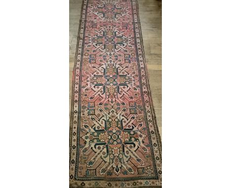 A Persian pink ground runner, 340 x 134 cm