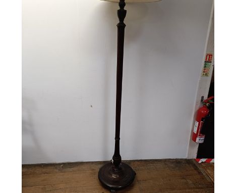 A mahogany bureau, 76 cm wide, an armchair and a standard lamp (3)