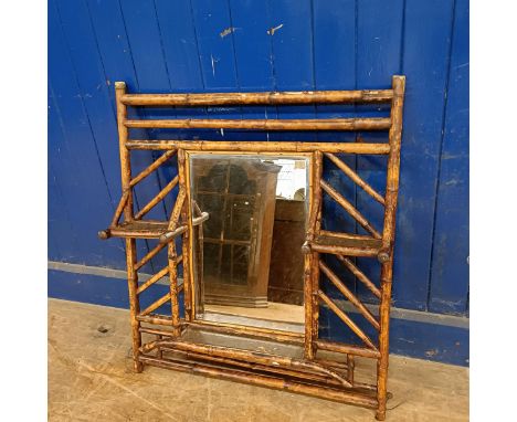 An early 20th century bamboo framed wall mirror, 90 x 78 cm15 cm deep