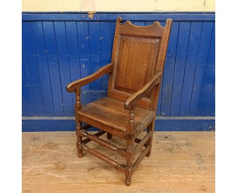 An oak Wainscot type armchair