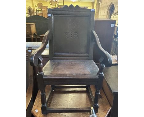 An oak Wainscot type armchair