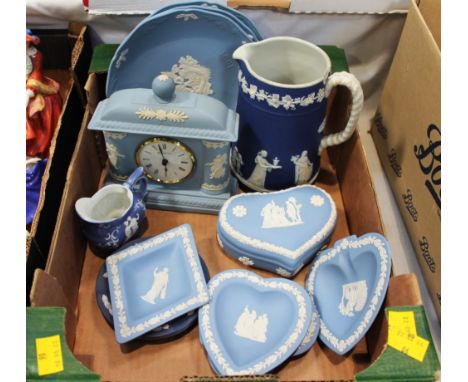 Box of blue and white Wedgwood Jasperware, clock, Xmas plates, pin dishes, trinket pots etc