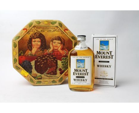 Vintage Mummy's Fruity Cake tin and bottle of Mount Everest blended whisky 375 ml with box, "Bottled in Nepal"