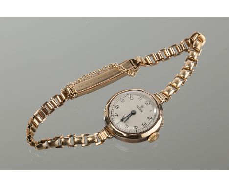 LADY'S EARLY TWENTIETH CENTURY NINE CARAT GOLD ROLEX PRIMA COCKTAIL WATCH
silvered dial with Roman numerals and subsidiary se