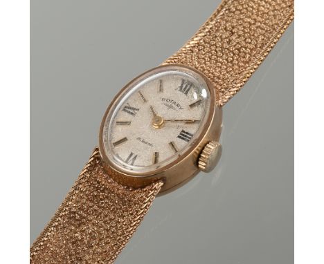 LADY'S NINE CARAT GOLD ROTARY WRISTWATCH WITH GOLD BRACELET STRAP
the silvered dial with Roman numerals and baton hour marker