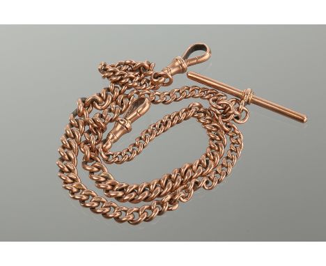 NINE CARAT ROSE GOLD GRADUATED CURB LINK POCKET WATCH DOUBLE ALBERT CHAIN
each link hallmarked nine carat gold, with hallmark