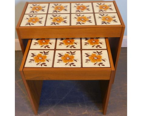 A nest of two 1970's retro style teak veneered tile top tables