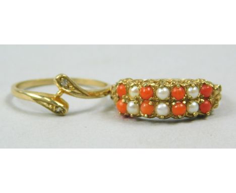 Two dress rings, to include a 9ct gold dress ring, set with eight coral beads, and six seed pearls, and another twist ring, s