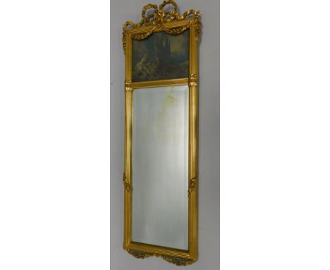 A narrow Continental overmantel mirror, in gilt gesso frame, with a ribbon and swag decorated crest above a coloured printed 