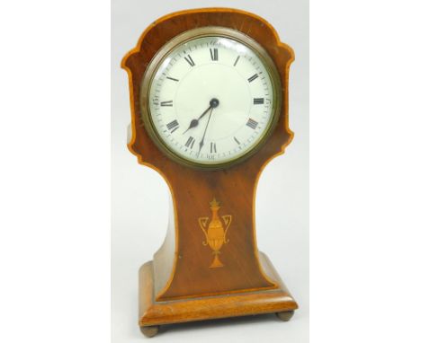 An Edwardian mahogany mantel clock, with a domed enamel 9cm dia Roman numeric dial, in an inlaid stylised balloon case, raise