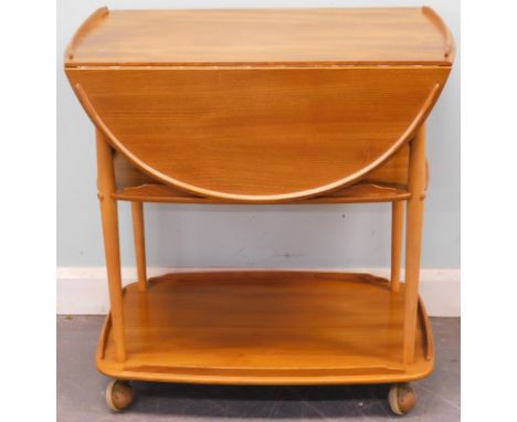 An Ercol light elm three tier drop leaf trolley, 74cm wide