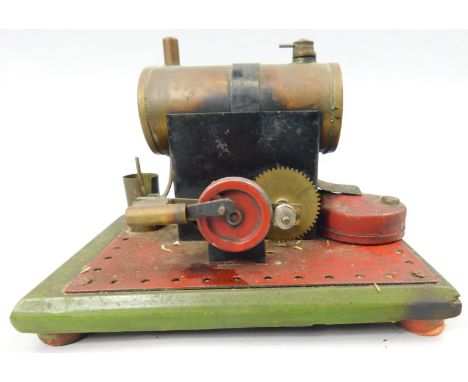 A tin plate static engine, painted in red and green livery, 18cm long