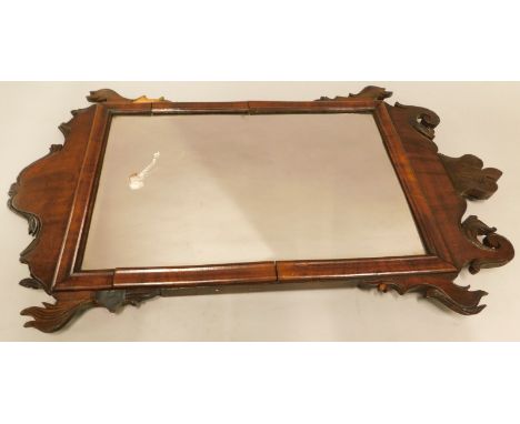 A fret frame wall mirror in George III style, engraved crest, moulded border and rectangular plate, 59cm x 35cm