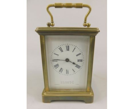 A brass carriage clock, the enamel dial indistinctly stamped with the retailer Fase and Co and French made, 14cm high