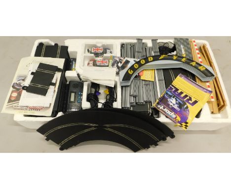 A Hamleys Scalextric Mini Cooper Challenge Premium Collection slot car racing set, possibly incomplete.