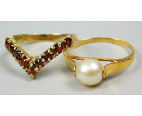 Two 9ct gold dress rings, to include a V shaped ring set with tiny garnets, and one set with cultured pearl, 4.7g all in. 