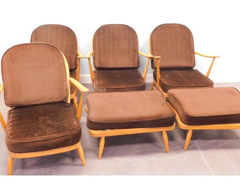 A set of four Ercol cottage type open armchairs, each with loose cushions and two matching stools