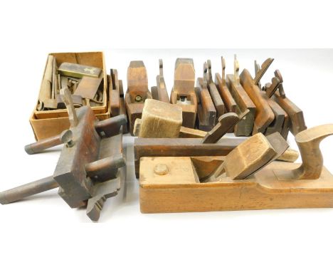 A quantity of wooden block planes, small metal plane set square and various other tools
