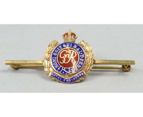 A Royal Engineers brooch, with a crest, with blue and red enamel design, yellow metal, marked 9ct, 5cm wide, 5.3g all in. 