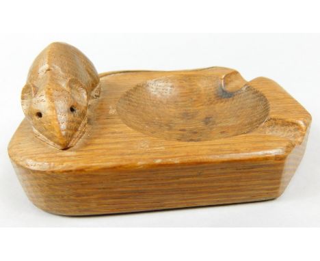 A Robert Mouseman Thomson ashtray, of canted rectangular form carved with a mouse, 11cm long