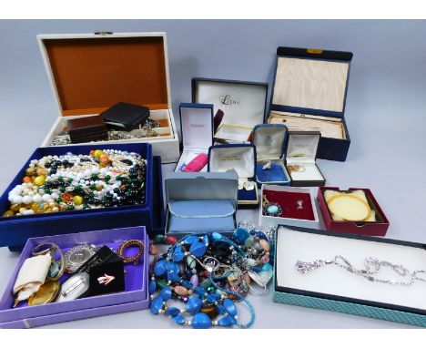 A quantity of modern costume jewellery, to include ladies and gents wristwatches, beaded necklaces, Ronson lighter, clip on e