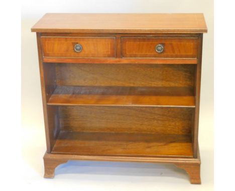 A mahogany and boxwood strung bookcase, with two frieze drawers on bracket feet, 79cm wide.