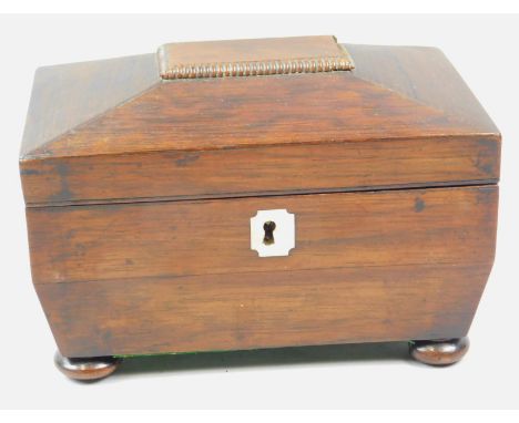 A Victorian rosewood tea caddy, with mother of pear escutcheon on bun feet, 19cm wide.