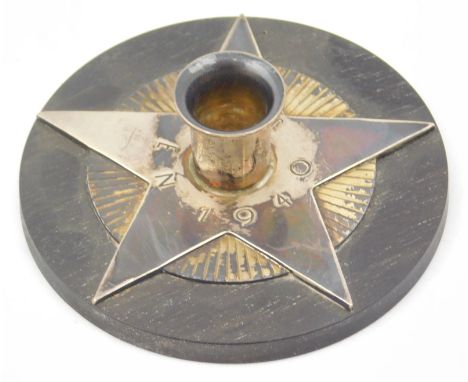 A 20thC Danish sterling candlestick, by Georg Jensen, compressed dish holder on star and circular base, marked Julen 1940, nu
