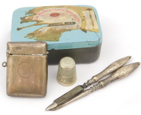 A George V silver vesta case, with engine turned decoration, Chester 1913, two silver and steel manicure implements and a pla