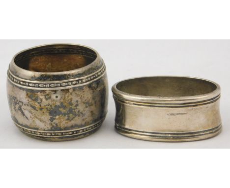 A Danish oval napkin ring, stamped 830, and a further napkin ring, 1½oz