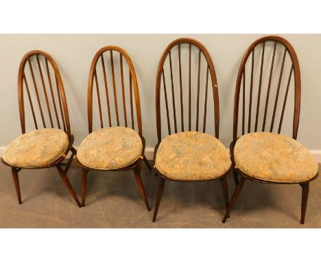A set of four Ercol stickback kitchen chairs, with turned legs