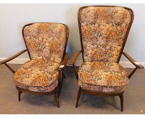 Two similar Ercol type cottage style open armchairs, each with a cushioned back and seat, on turned tapering legs