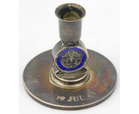 A mid 20thC sterling candlestick, by Georg Jensen with cylindrical dish holder, circular centre, marks Freg Paajorg on circul