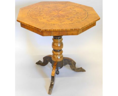 A Victorian walnut and parquetry occasional table, the octagonal top, decorated with a central star motif on a banded turned 