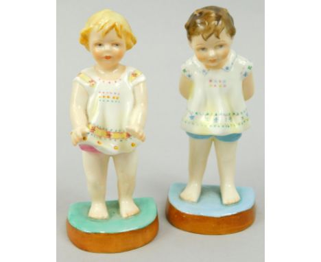 A Royal Worcester Freda Doughty figure of Joan, polychrome decorated printed marks beneath, number 2195, 12cm high, and anoth