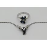 1 Damenring WG 18ct. lt. Quittung Juwelier Hildebrandt: mit (tropfenförmigen) Saphiren zus. 1,31ct.
