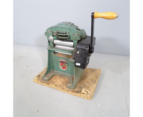 A Landis model 30, number 710139 roller skiver splitter. From the workshop of saddle maker Brian R. Borrer (Artistry in Leath