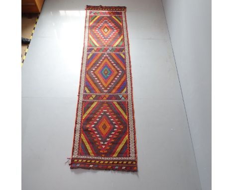 A Suzni Kilim runner. 310x78cm. 