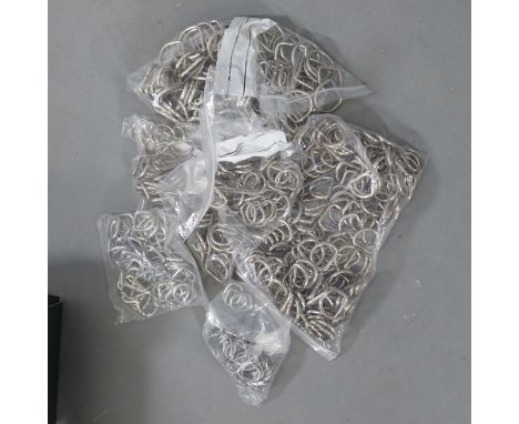 A quantity of assorted stainless steel D-rings.From the workshop of saddle maker Brian R. Borrer (Artistry in Leather), Beckl