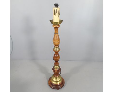 A turned mahogany and brass mounted standard lamp. H to screw fitting - 134cm.2-pin plug fitted, unable to test. 