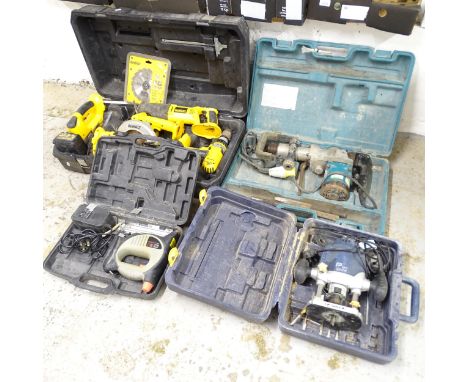 A Makita mini breaker, a De Walt multi tool set, P pro router, and a SIP-group nail gun, all in cases. 