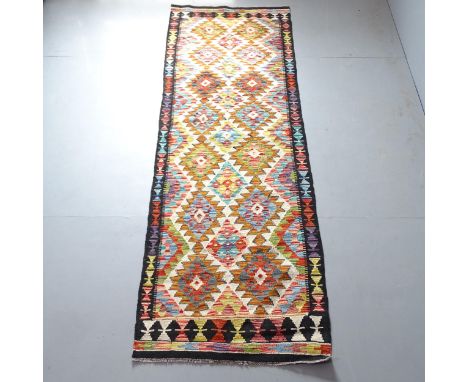 A Chobi Killim runner. 247x82cm. 